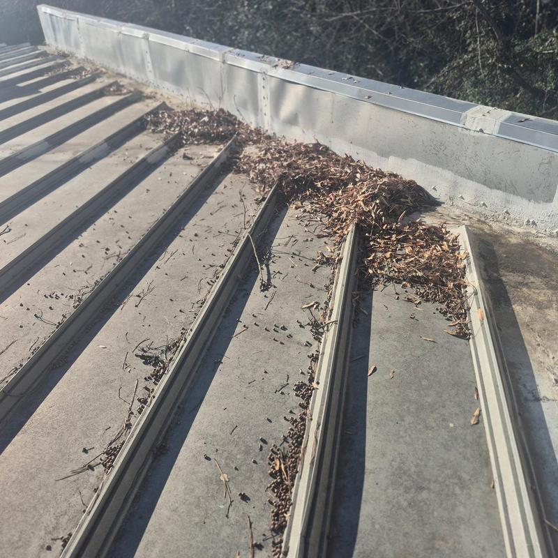 Project photo: Metal Roof Leak Repair at Wall Tie-In Fluid Applied System in South Charlotte