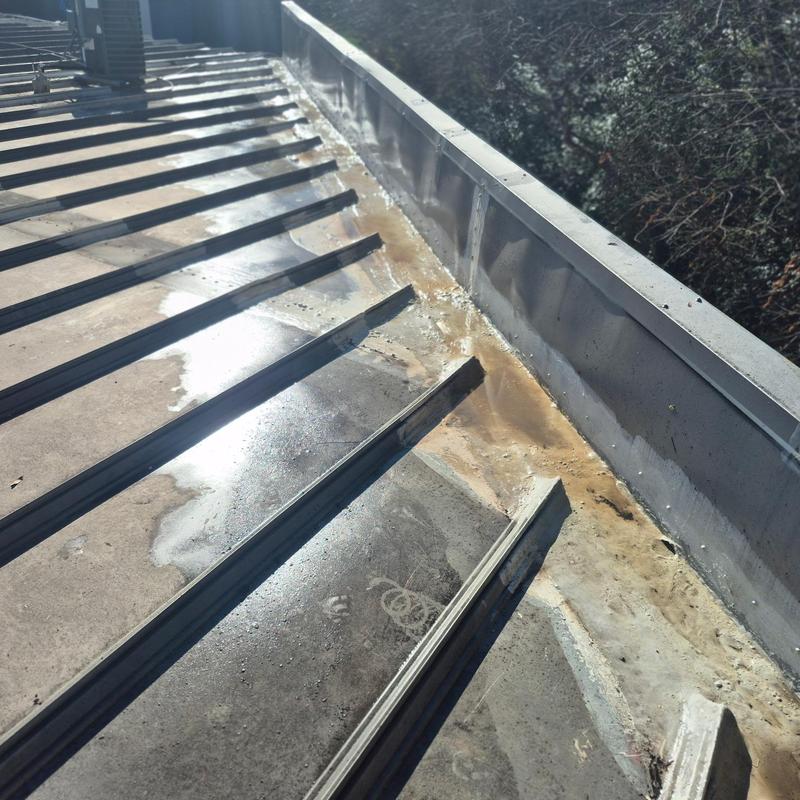 Metal Roof Leak Repair at Wall Tie-In Fluid Applied System in South Charlotte project photo 4