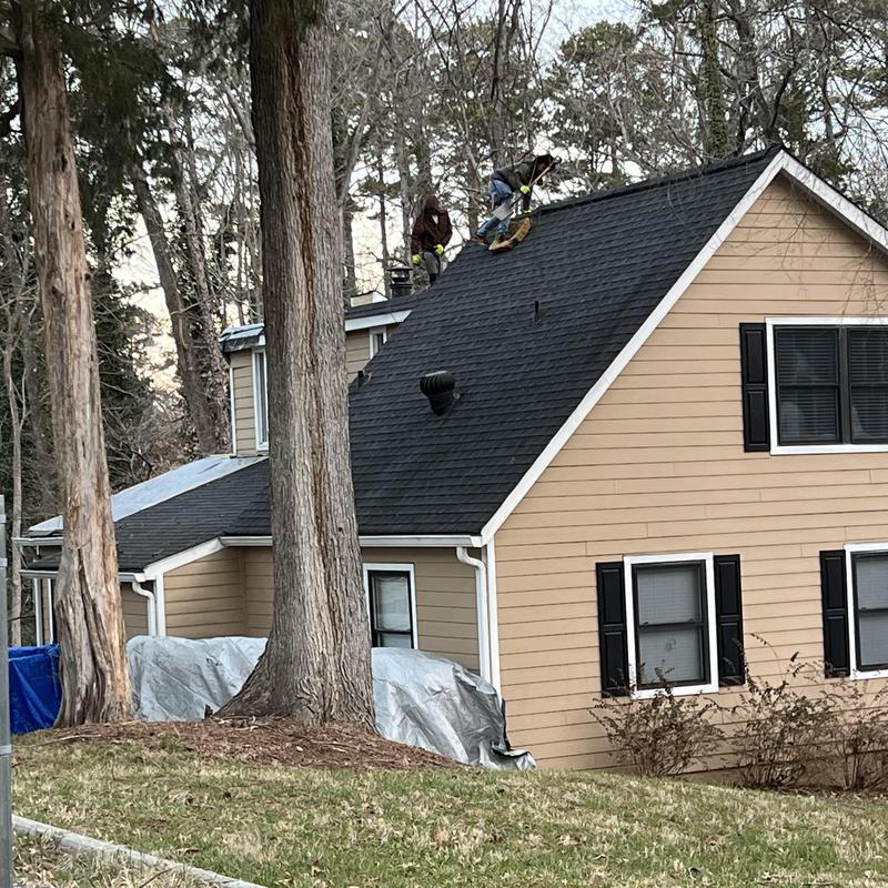 Charlotte, NC Roof Replacement - a tree hit this house and project photo 2