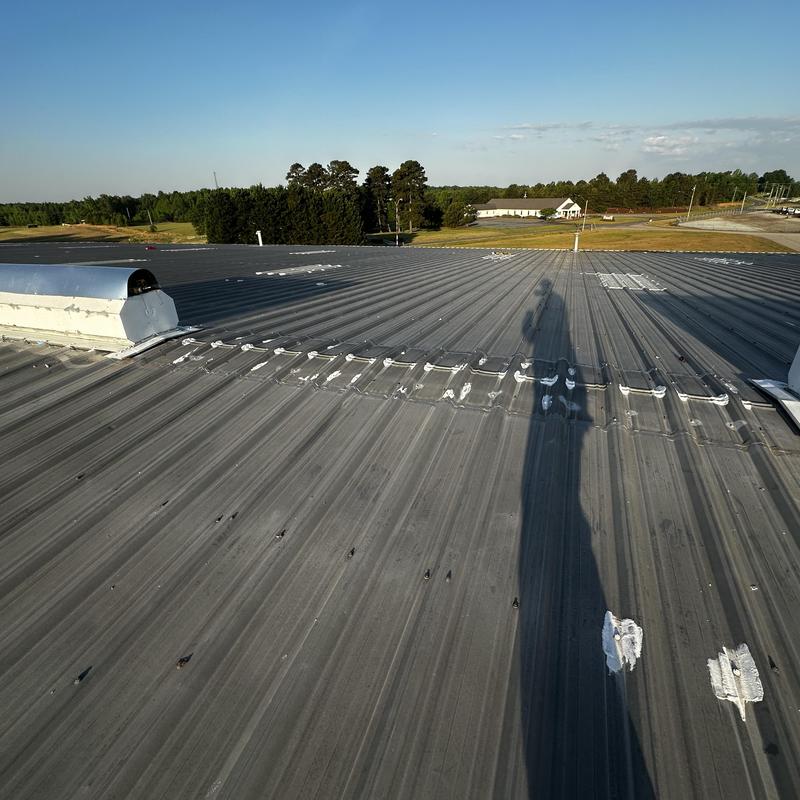 Industrial Roof Restoration & Custom Ridge Vent Hood Installation Roxboro, NC project photo 5