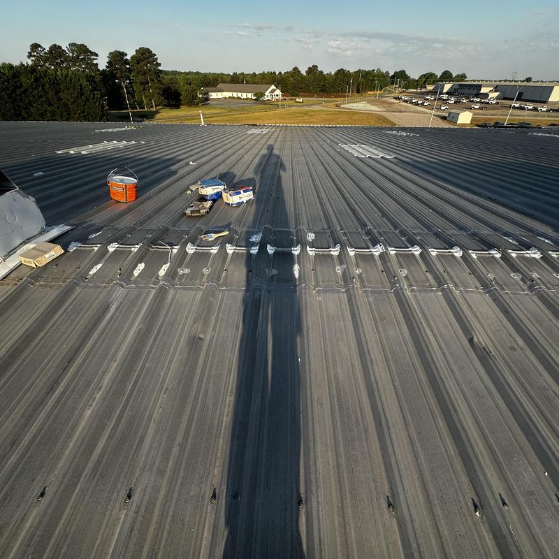 Industrial Roof Restoration & Custom Ridge Vent Hood Installation Roxboro, NC project photo 2