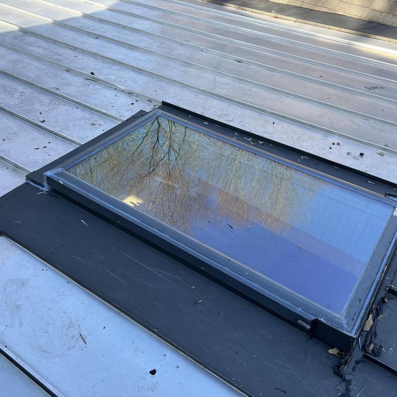 Charlotte, NC Roof Inspection - The skylight on the metal project photo 2