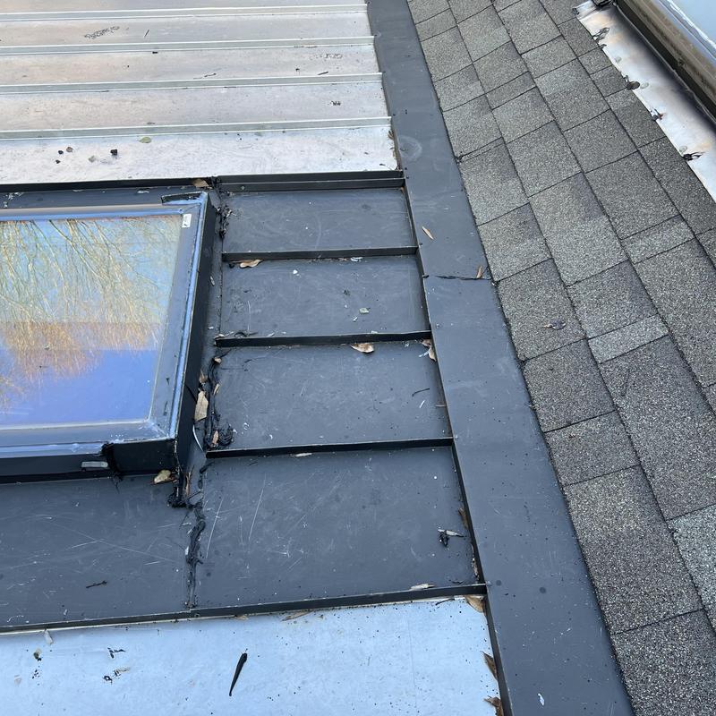 Charlotte, NC Roof Inspection - The skylight on the metal project photo 3
