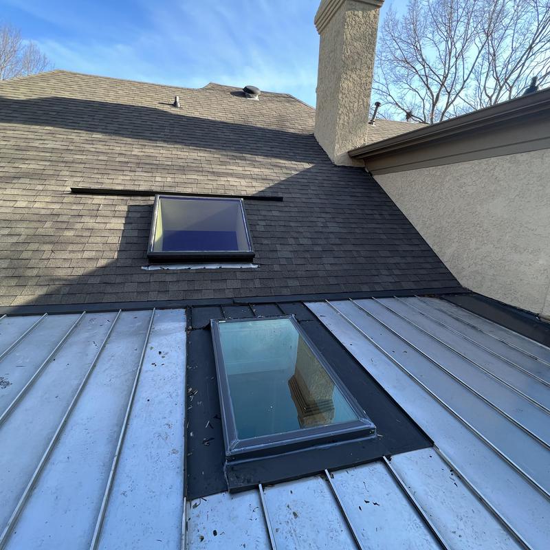 Charlotte, NC Roof Inspection - The skylight on the metal project photo 5