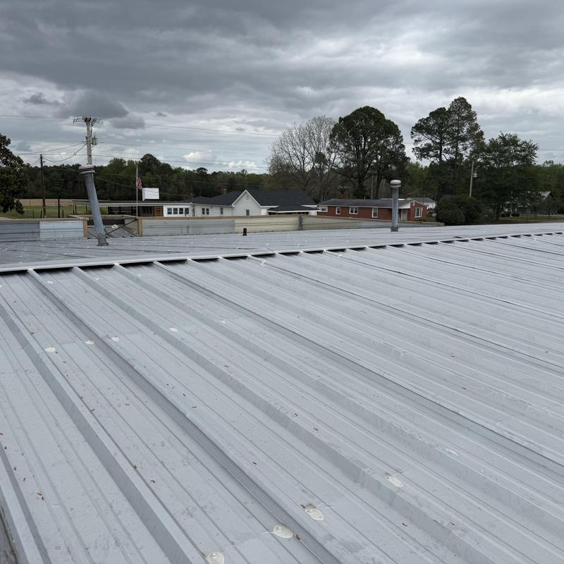 TPO Retrofit Roof Design with Drainage Improvements Wilson, NC project photo 2