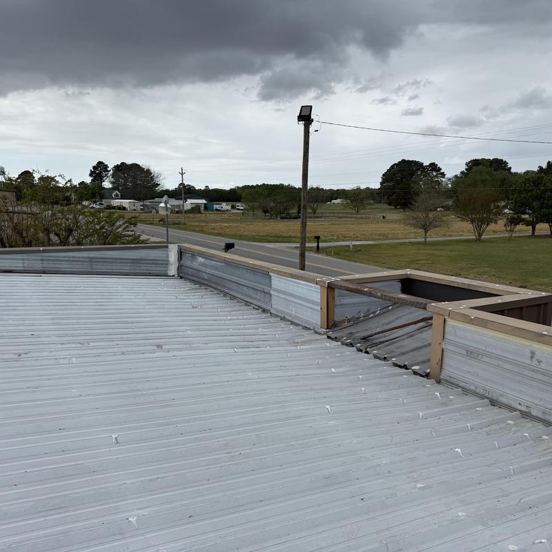 TPO Retrofit Roof Design with Drainage Improvements Wilson, NC project photo 4