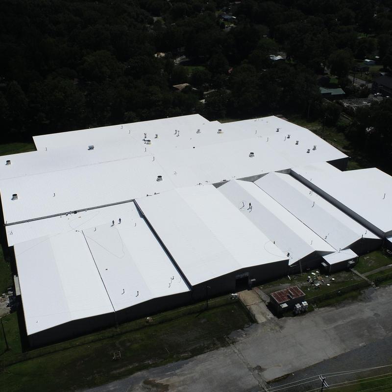 Project photo: 150,000 SF Industrial Roof Restoration with Acrylic Coating | Dalton, GA (Charlotte-Based Team)