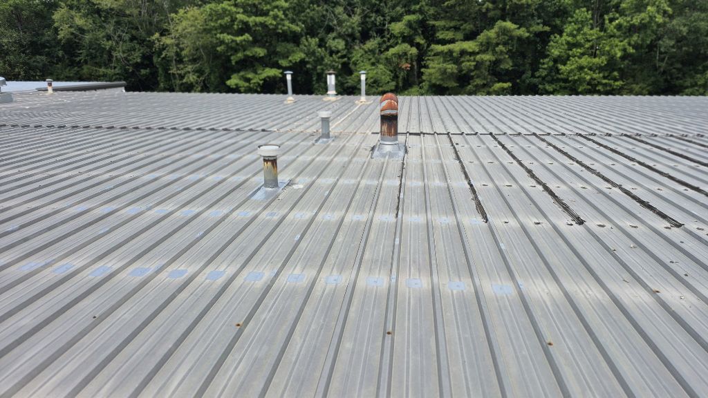 Commercial Metal R-Panel Sealing – Monroe, NC project photo 2