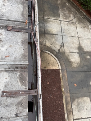 Commercial Metal Roof Fastener Sealing and Gutter Outlet Clearing – Charlotte, NC project photo 5