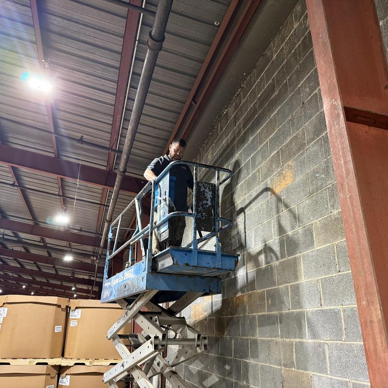 Roof-to-Wall Leak Repair on SPF-Coated PBR Metal Roof | 120,000 SF Facility project photo 4
