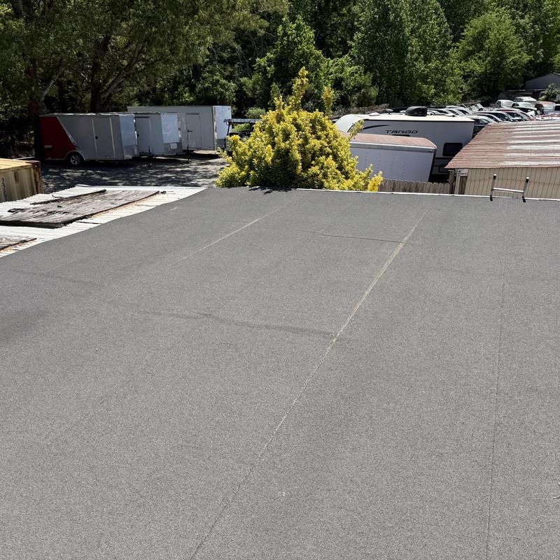 Project photo: Modified Bitumen Roof Holding Strong After 12 Years + Shingle Roof Inspection in Matthews, NC