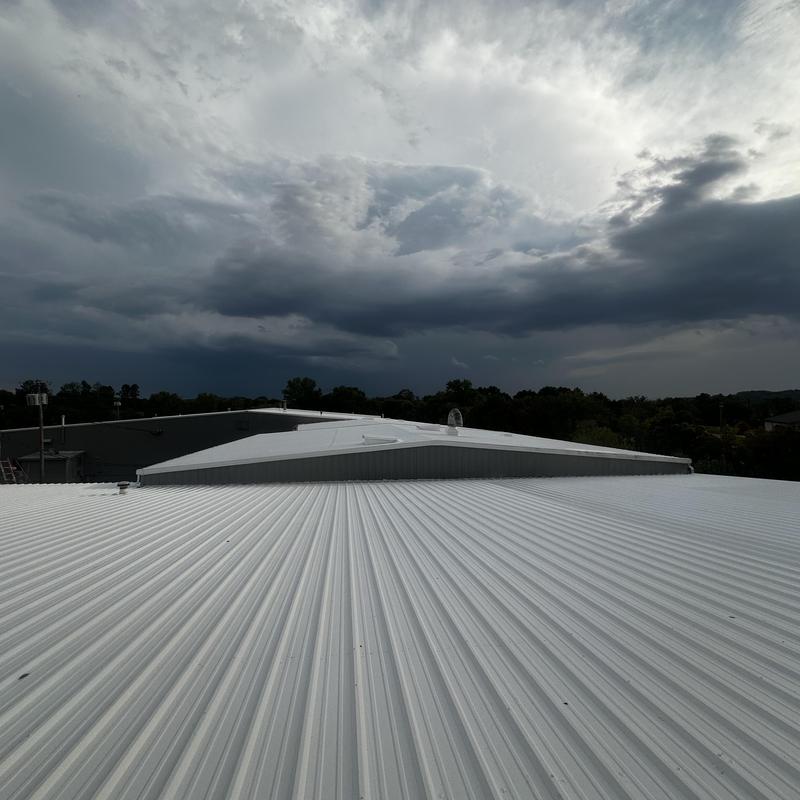 Project photo: 150,000 Sq Ft Metal Roof Coating System in Columbia, TN Stops 50+ Leaks
