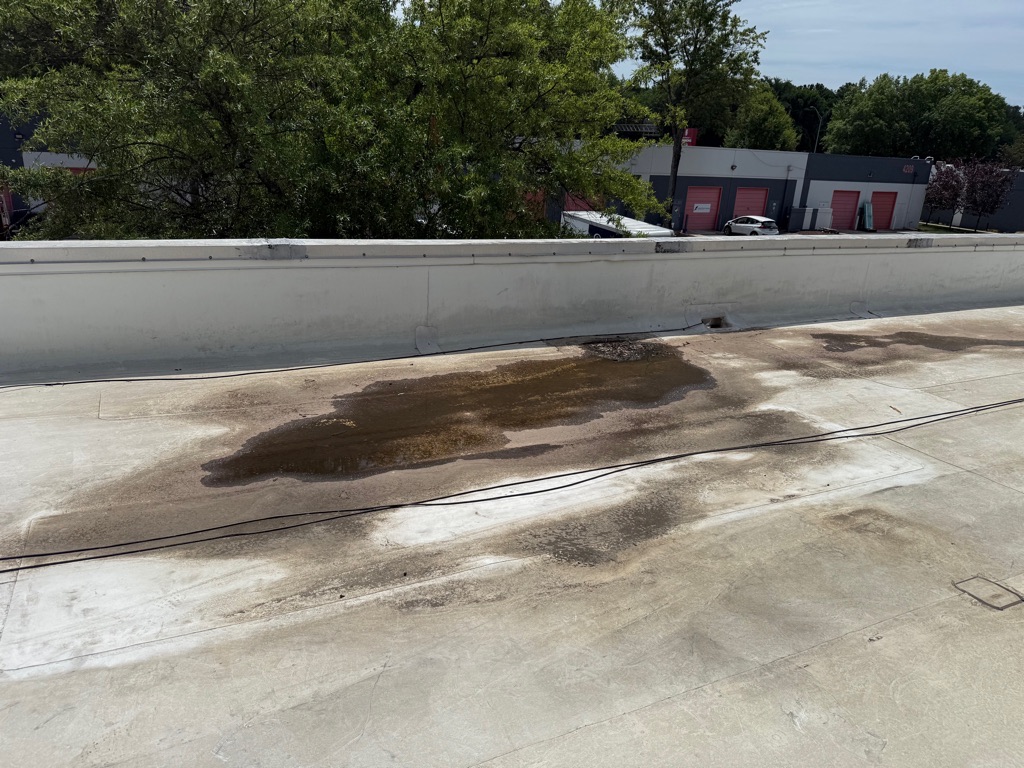 Project photo: Commercial Deteriorated Membrane Repair and Silicone Coating – Charlotte, NC