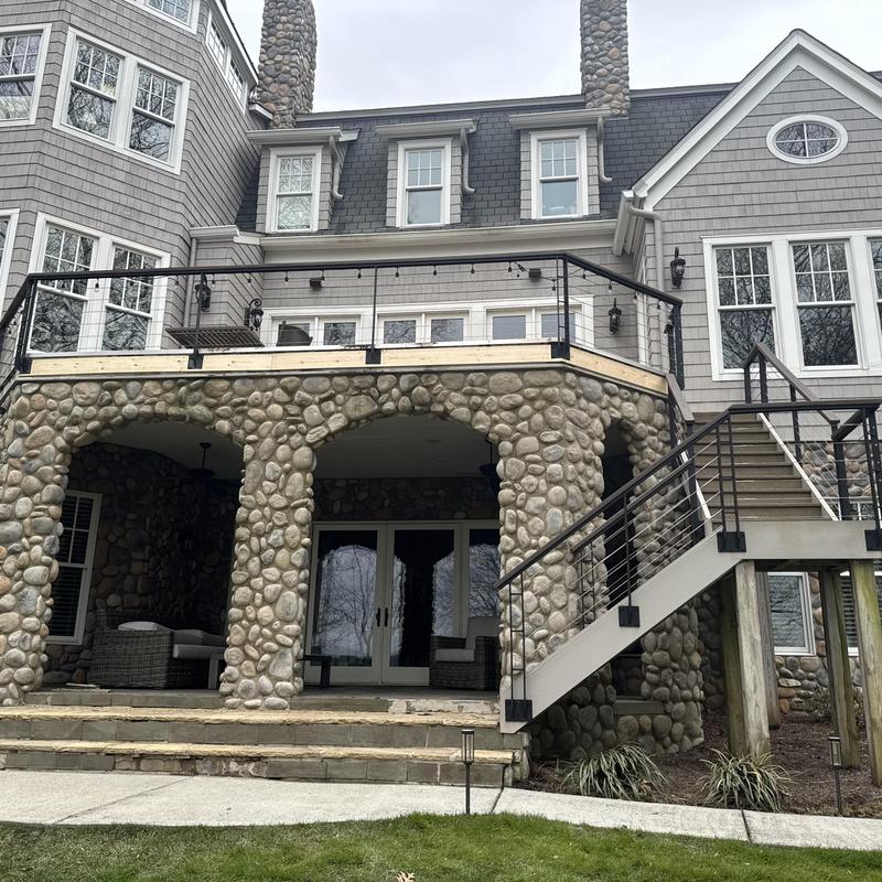 Project photo: Custom Stone Chimney Roof Repair & Decking Replacement | South Charlotte Luxury Home