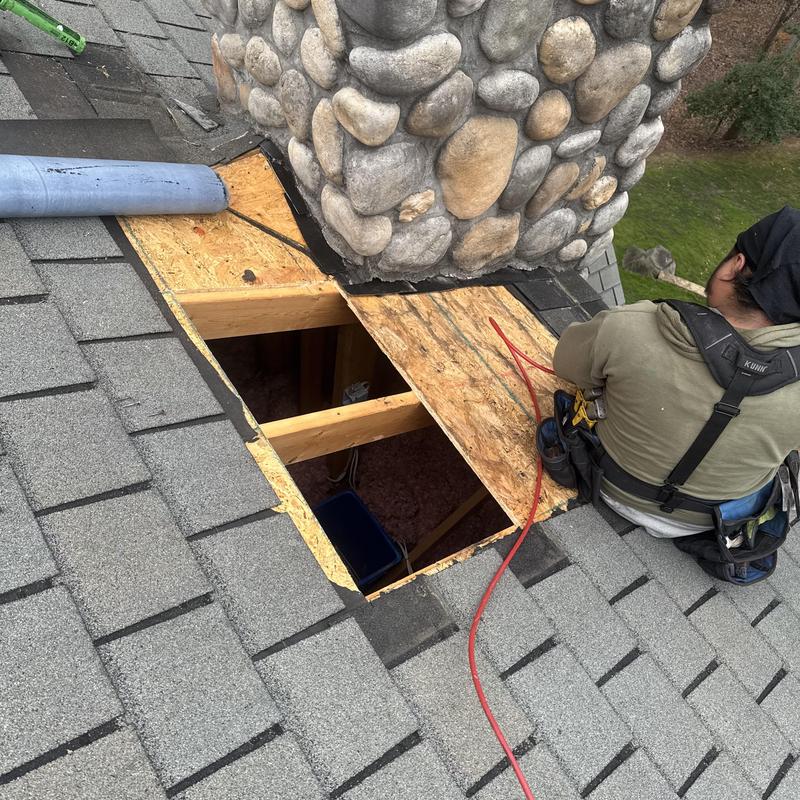Custom Stone Chimney Roof Repair & Decking Replacement | South Charlotte Luxury Home project photo 1
