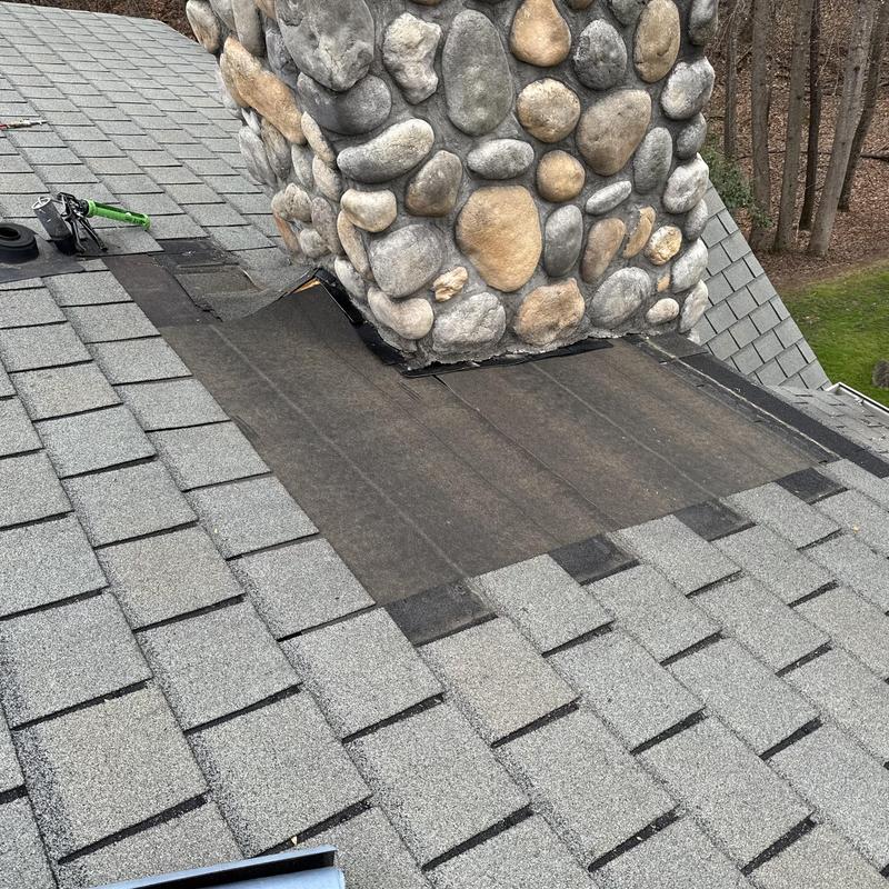 Custom Stone Chimney Roof Repair & Decking Replacement | South Charlotte Luxury Home project photo 3