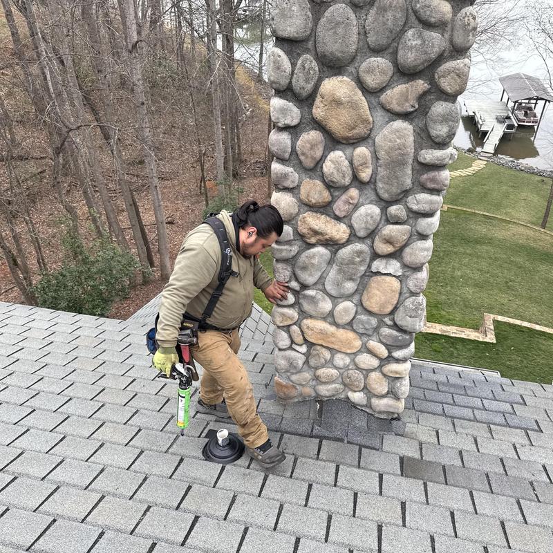 Custom Stone Chimney Roof Repair & Decking Replacement | South Charlotte Luxury Home project photo 5