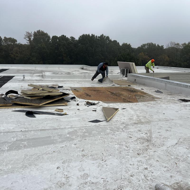 Charlotte, NC - TPO flat roof repair. There are 9 leaks in project photo 1