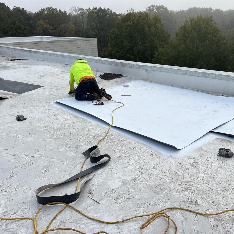Charlotte, NC - TPO flat roof repair. There are 9 leaks in project photo 4