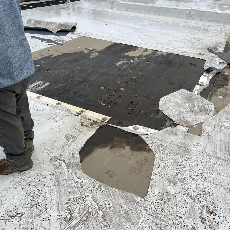 Charlotte, NC - TPO flat roof repair. There are 9 leaks in project photo 2