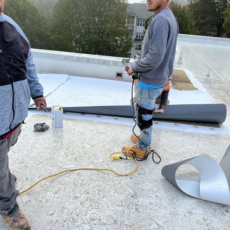 Charlotte, NC - TPO flat roof repair. There are 9 leaks in project photo 5