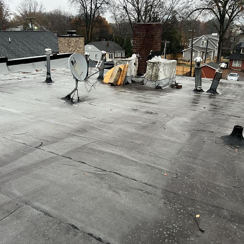 Project photo: Charlotte, NC Flat Roof Leak Inspection. This old torch